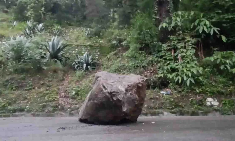 boulders from the hills on the road