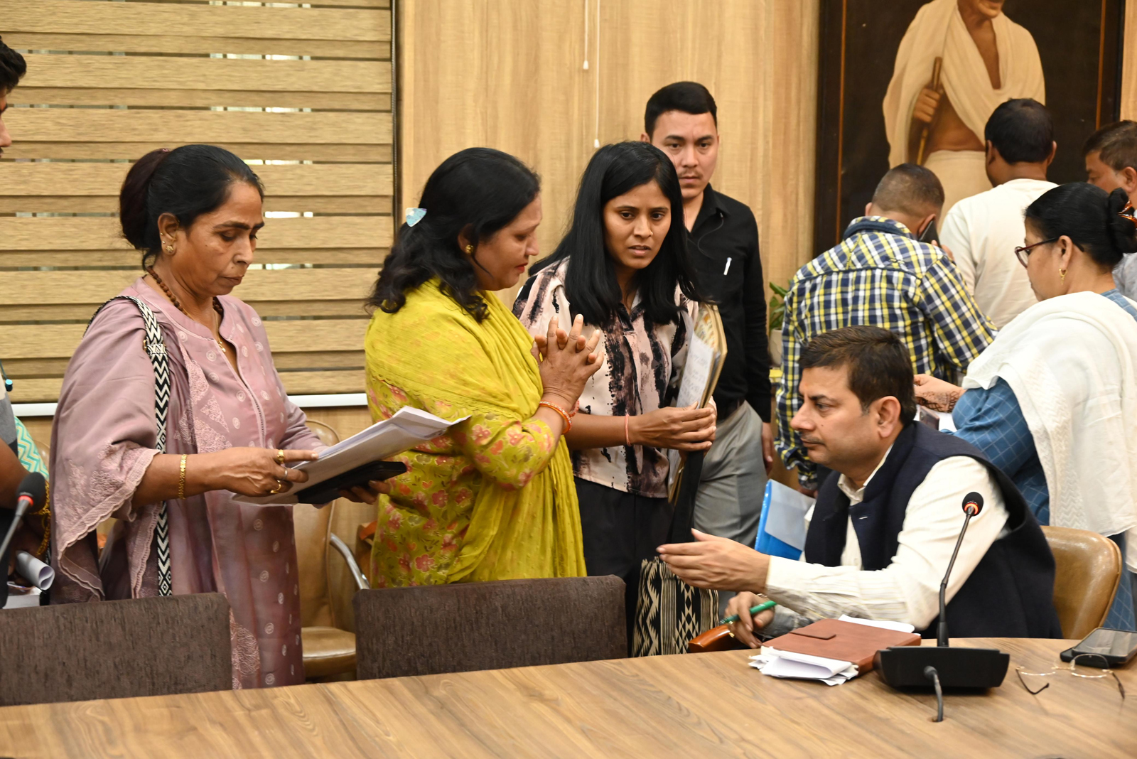 Elderly women raise property dispute complaints at public hearing in Dehradun