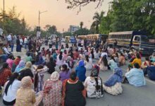 NEM protesters block the road near Parade Ground while demonstrating on Tuesday evening