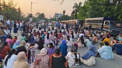 NEM protesters block the road near Parade Ground while demonstrating on Tuesday evening