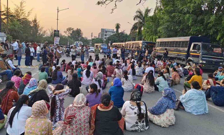 NEM protesters block the road near Parade Ground while demonstrating on Tuesday evening