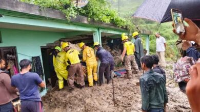 Rescue teams at the home where three died after a disaster